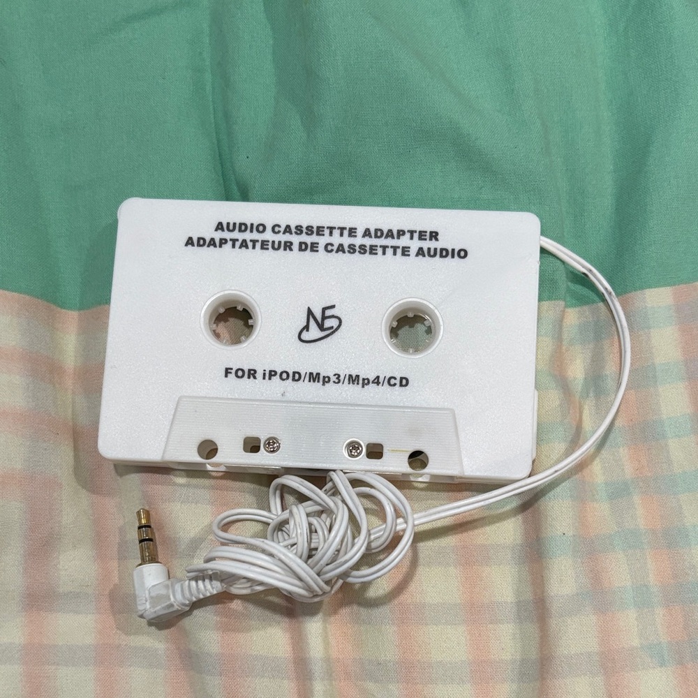 Audio cassette adaptor for vehicles
